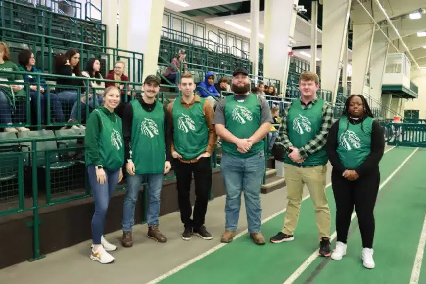 group of students smiling during secret service event